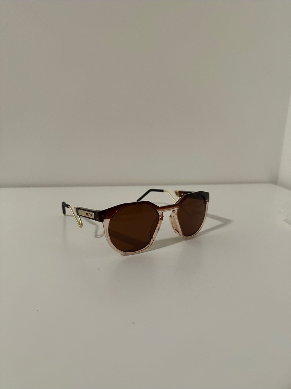 Oakley Men’s Brown Lensed Sunglasses with Gold Temple Accents
